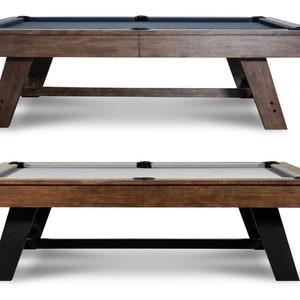 May include: Two pool tables with a brown wood finish and different leg styles. The top table has dark brown legs and the bottom table has black legs.