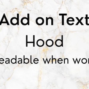 May include: Image with the text "Add on Text Hood Readable when worn" in a bold, black font. The background features a white marble pattern with gold veining.