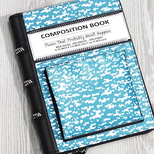 May include: A composition book-style zippered case with a blue and white splatter pattern. The cover reads "COMPOSITION BOOK" and "Plans That Probably Won't Happen." It measures 9.75 inches by 7.5 inches.