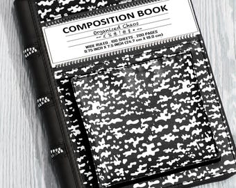 May include: A black and white composition book cover with a camouflage-like pattern, featuring a white label with the text COMPOSITION BOOK, Organized Chaos, and 9.75 inch x 7.5 inch. The cover includes a black spine and a front pocket.