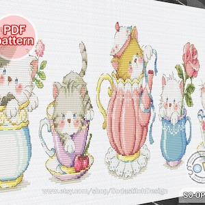 May include: Cross stitch pattern featuring five adorable kittens peeking out of teacups and a teapot. The kittens are white, grey, and yellow with pink cheeks and blue eyes. The teacups and teapot are decorated with floral patterns and have a vintage aesthetic. The pattern is titled "SO-OPG179" and is available as a PDF download.