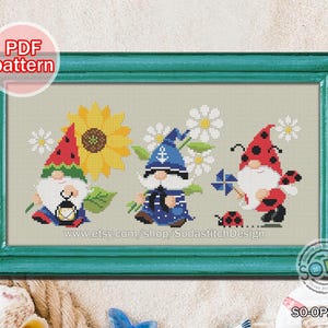 May include: Cross stitch pattern featuring three gnomes with a sunflower, watermelon, and ladybug design. The pattern includes the text "www.etsy.com/shop/SodastitchDesign".