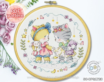 May include: Cross stitch pattern featuring two cute cartoon cats, one holding a bunny and the other holding a purple heart. The pattern is surrounded by stars, hearts, and flowers. The text "SO-OPG172C" is in the bottom right corner.
