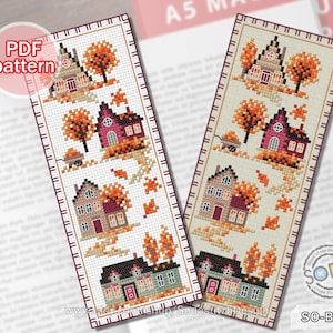 May include: Cross stitch bookmark pattern featuring a charming autumn scene with houses, trees, and falling leaves. The pattern is available as a PDF download. SO-BM64
