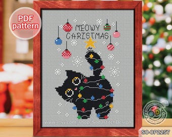 May include: A cross-stitch pattern featuring a black cat dressed as a Christmas tree. The cat is decorated with colorful ornaments and lights. The text "MEOWY CHRISTMAS" is written above the cat.