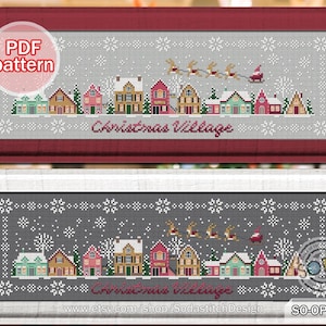 May include: A cross stitch pattern for a Christmas village scene. The pattern features a row of houses with snow-covered roofs and a sleigh pulled by reindeer flying overhead. The text "Christmas Village" is printed below the houses.