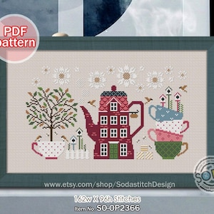 May include: Cross-stitch pattern showing a tea party scene. A teapot-shaped house, stacked teacups, and a tree are in a framed design. The colour palette includes red, green, and white, with the text "PDF pattern" in the upper left corner.