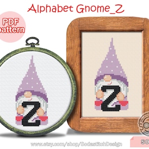 May include: A purple gnome with a white hat and a white beard holds a black letter Z in its hands. The gnome is holding the letter Z in front of its body. The gnome is surrounded by a white background. The image is labelled "Alphabet Gnome_Z" and "S0-Z".