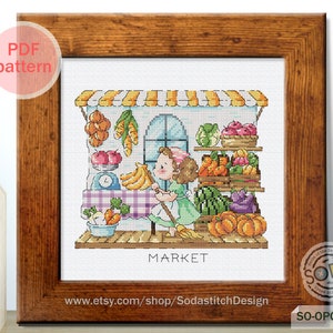 May include: Cross stitch pattern of a girl shopping at a market. The market is a small building with a striped awning and a window. The girl is holding a broom and there are many fruits and vegetables on display. The text "MARKET" is below the building.