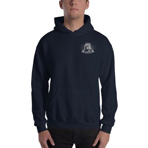 May include: A navy blue hooded sweatshirt with a white graphic of a welder on the left chest. The graphic includes the word "Welder" in a banner.