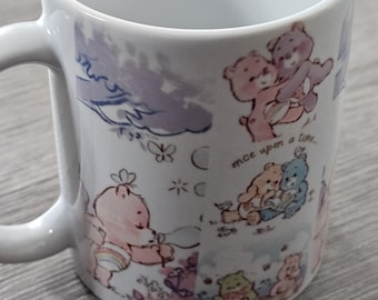 80s mugs -soft pastel colors, the mug features adorable Care Bear designs that will brighten your day and evoke fond childhood memories.