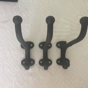 3 ANTIQUE Cast Iron Hooks
