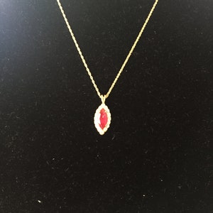 Vintage Red and Clear Rhinestone Gold Tone Necklace