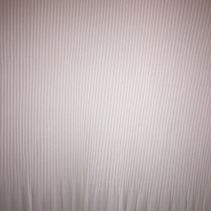 May include: White fabric with a vertical ribbed texture. The fabric has a subtle sheen and a smooth, soft feel.