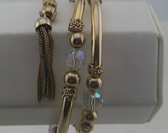 Gold Tone Wrap Bracelet with Beads and Tassels
