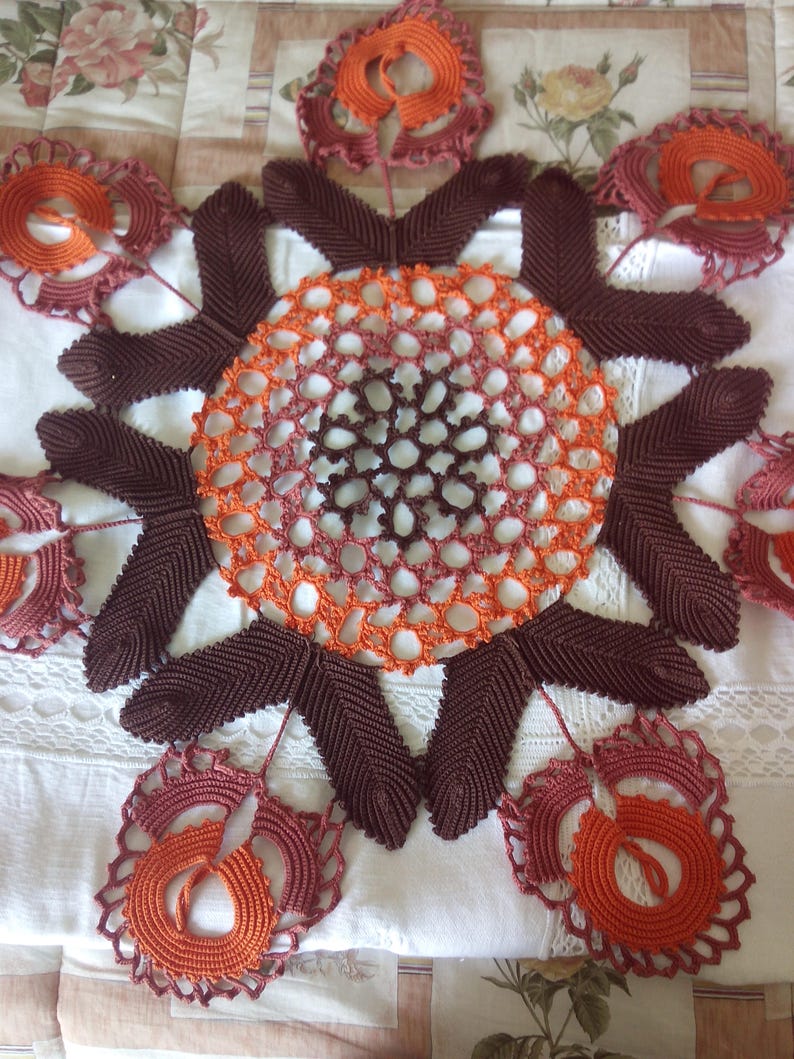 round centered crocheted stylized flowers image 1