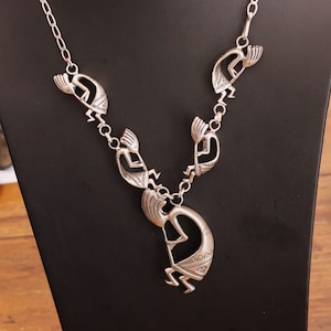 Substantial (65 grams) Hallmarked Vintage (1970&#39;s) Navajo Kokopelli sterling silver necklace 25 wearable inches 5 Kokopelli pendants