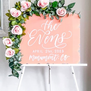 16x20 inch acrylic wedding sign with coral pink painted background and white lettering