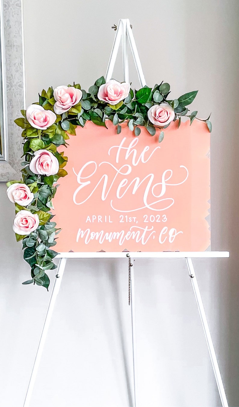 16x20 inch acrylic wedding sign with coral pink painted background and white lettering