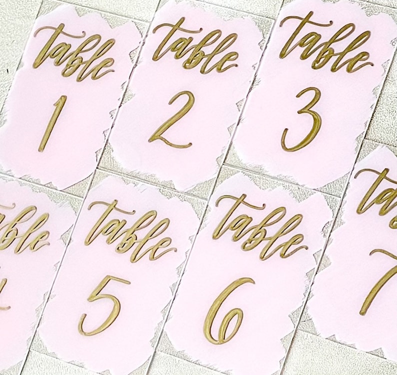 4 x 6“ Acrylic Wedding table numbers with blush pink painted background and gold calligraphy