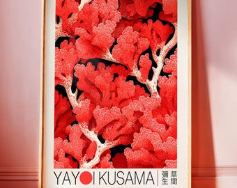 May include: A framed art print featuring a vibrant red coral reef design against a black background. The artwork includes white branches and the text "YAYOI KUSAMA" with Japanese characters. The print is in a wooden frame.