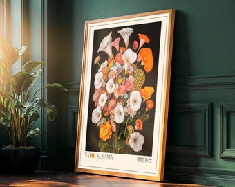 May include: A framed print of a floral still life painting by Yayoi Kusama. The painting features a bouquet of white and orange flowers on a black background. The artist's name and signature are visible in the bottom left corner of the print.