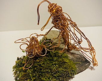 Pollinating moth copper wire art on moss slate plinth