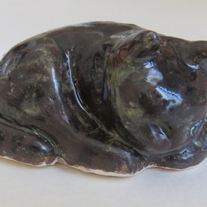 miniature Sleeping Cat ceramic sculpture dark brown with stripes on tail
