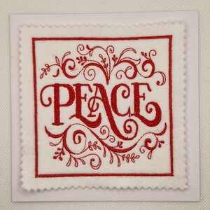 Carte de paix brodée tourbillon de Noël
