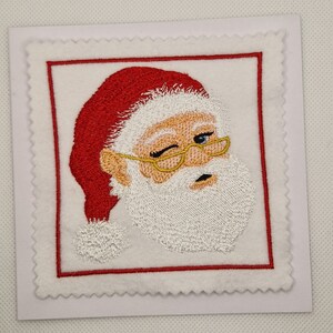 Carte brodée Père Noël avec un clin d'oeil