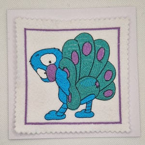 Carte brodée de paon mignon