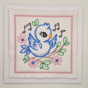 Carte brodée chant d'oiseau