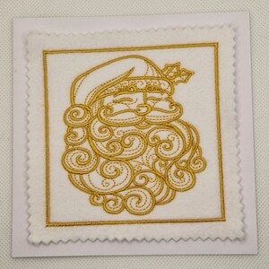 Carte de Père Noël brodée en or
