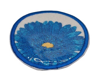 Broderad blomma gerbera tusensköna underlägg