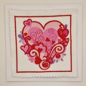 Carte brodée d'éclats de coeurs d'amour