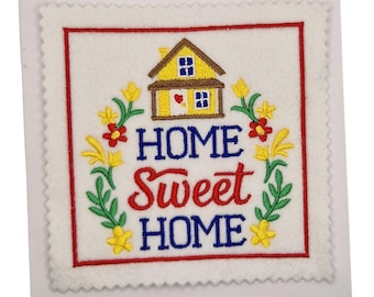Nouvelle carte brodée pour la maison