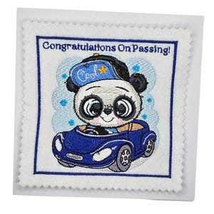 May include: Embroidered square card featuring a panda driving a blue car. The panda wears a blue cap with the word "Cool" and a gold star. The card has the text "Congratulations On Passing!" in blue.