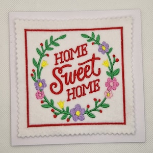 Nouvelle carte brodée pour la maison