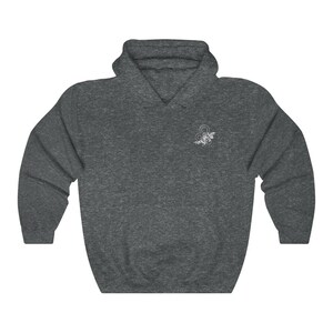 May include: A dark gray hooded sweatshirt with a white embroidered zodiac symbol of a lion on the left chest.