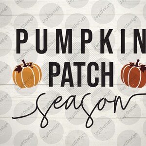 May include: A white wood sign with black text that reads "Pumpkin Patch Season". The sign is decorated with two orange pumpkins with brown stems and green leaves.