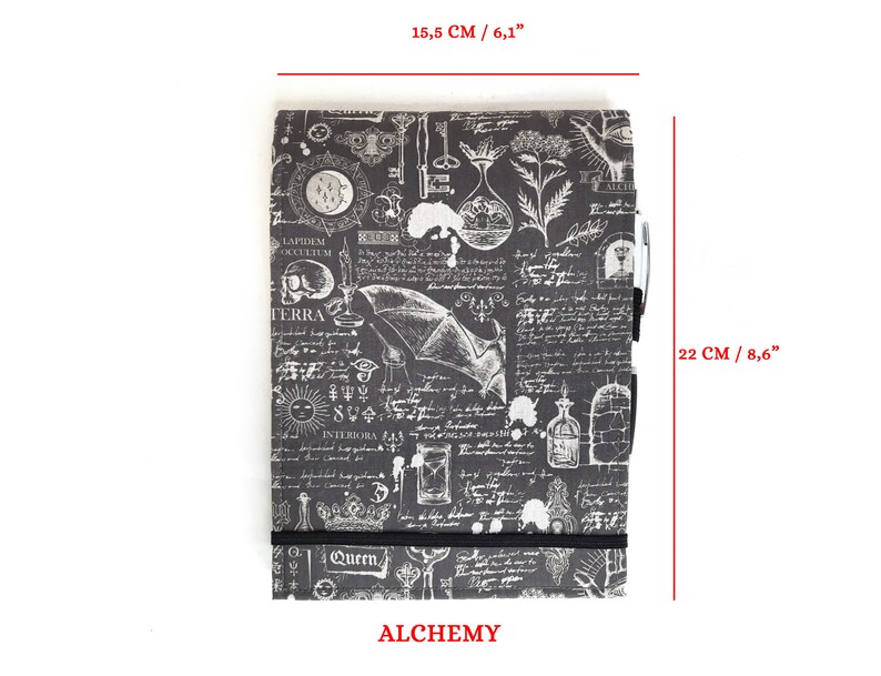 May include: A black and white notebook with a vintage alchemy design. The notebook measures 6.1 inches by 8.6 inches and has a black elastic band closure. The cover features a variety of illustrations, including a skull, a bat, a sun, a key, and a bottle. The text "ALCHEMY" is printed in red at the bottom of the notebook.
