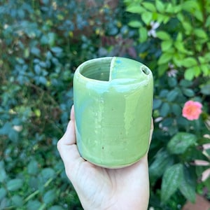 Handgemaakte kleine groene reismok
