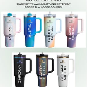 May include: A collection of Stanley 40 oz tumblers in various colors, including "Plume," "Aura," "Sunrise Spiral," "Dawn Spiral," "Chroma," "Fairy Dust," and "Cream Moon." Each tumbler has a handle and a straw.