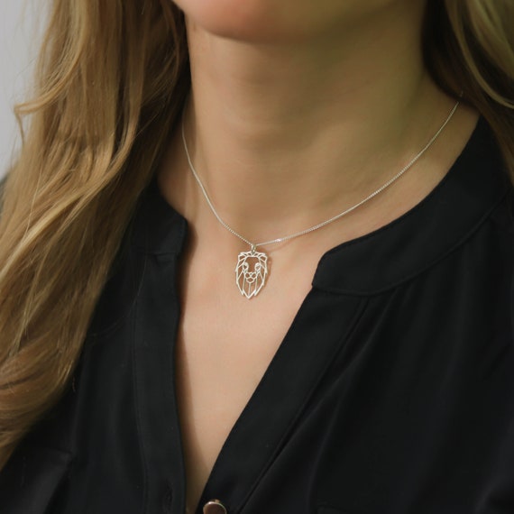 Silver chain hotsell with lion pendant