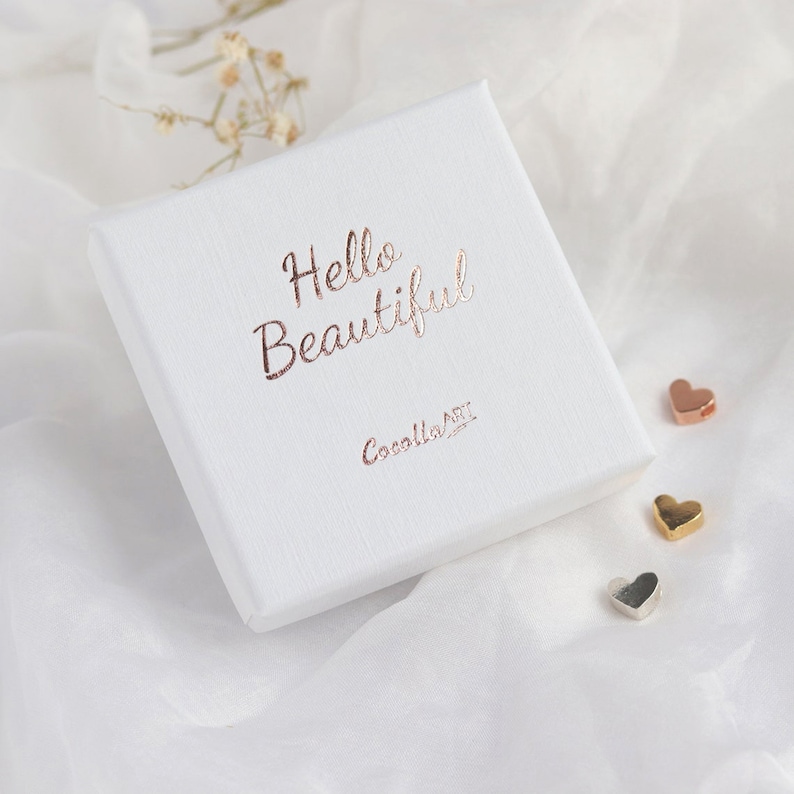 elegant white jewellery gift box with gold logo