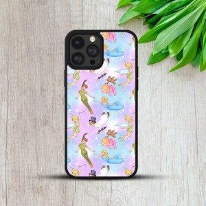 May include: Black phone case featuring a colorful pattern of Peter Pan characters, including Peter Pan, Tinkerbell, and Captain Hook, on a pastel blue, pink, and purple background. The case has a black border and a camera cutout.