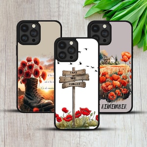 May include: Three phone cases with black edges. One case shows a boot filled with red poppies and text. Another has a sign reading "Lest We Forget" with poppies. The third case displays a poppy field with the word "REMEMBER".