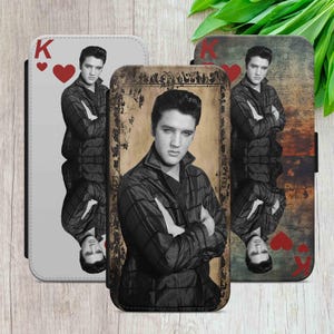 May include: Three phone cases with a black and white image of Elvis Presley. The cases feature a King of Hearts playing card design. The central case has a vintage-style border, while the others have a simple design.