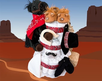 May include: A diaper cake decorated with a cowboy theme. The cake is made of diapers, and is decorated with a black horse, a wooden horseshoe, a red bandana, and a black cowboy hat. The cake is sitting on a red and brown desert background.