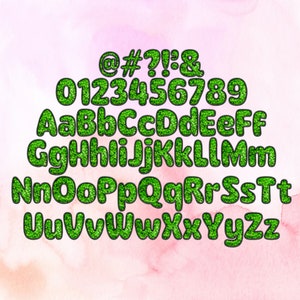May include: Green glitter font with uppercase letters and numbers, including symbols like @, #, ?, !, :, and &. The letters and numbers are outlined in black.